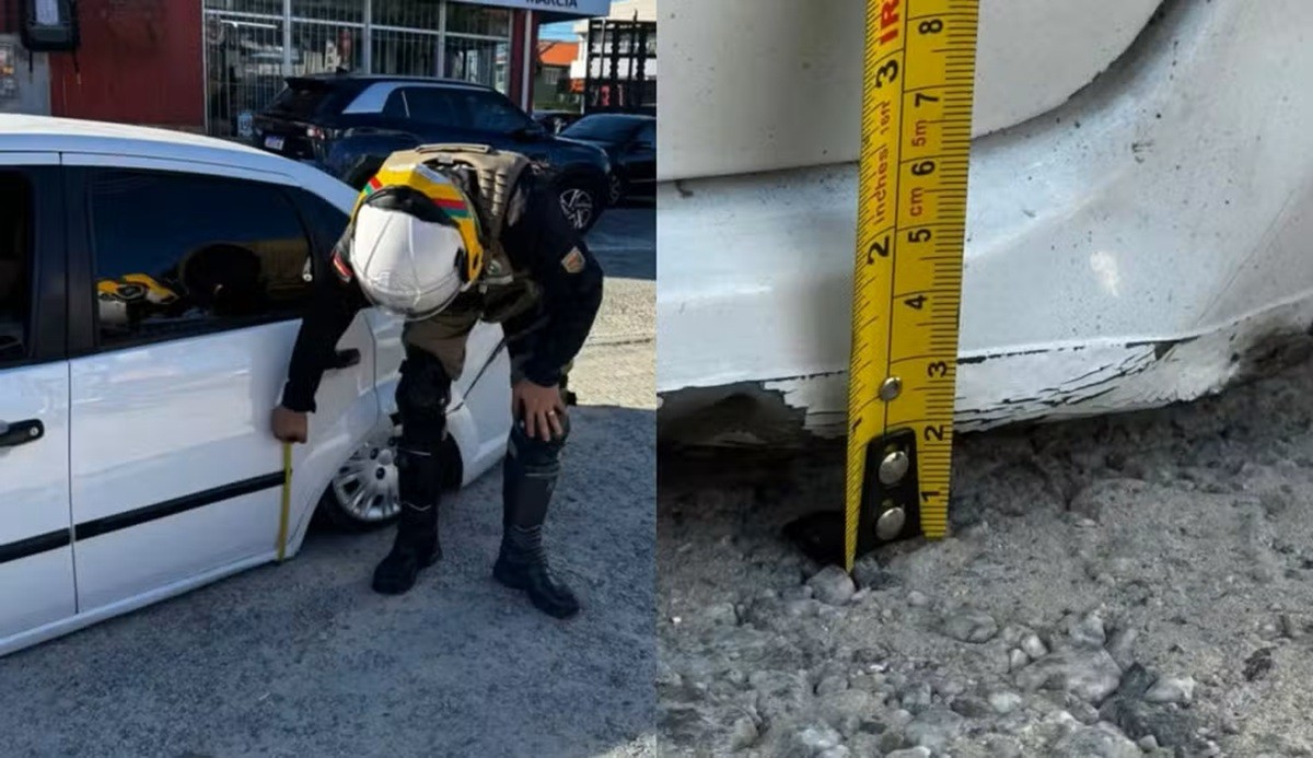 Carro rebaixado é flagrado a menos de 3 cm do chão e polícia usa fita métrica para medir irregularidade em Florianópolis