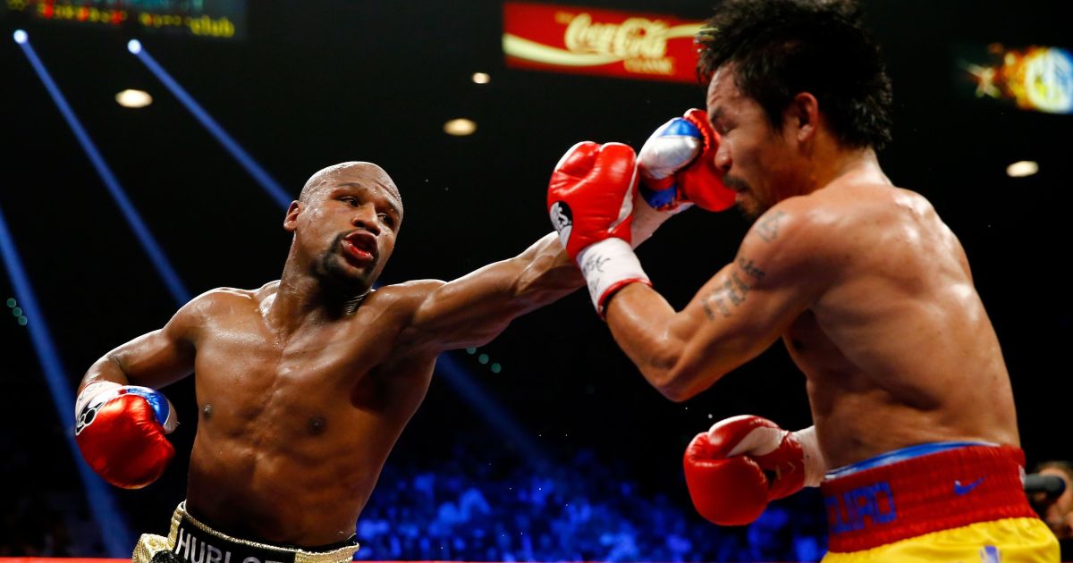 Boxe: Floyd Mayweather e Manny Pacquiao anunciam revanche na Sphere