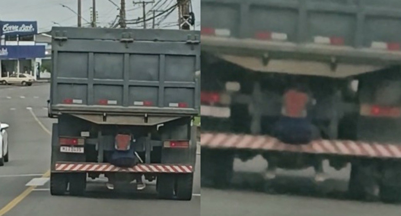 Homem é flagrado 'pegando carona' agarrado ao para-choque traseiro de caminhão em SC